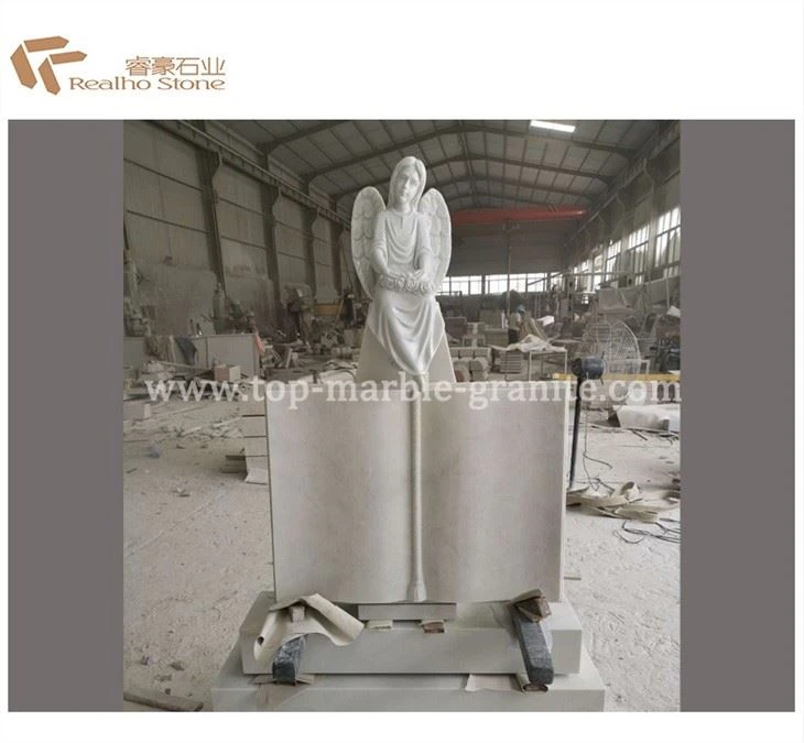 monument hand and book